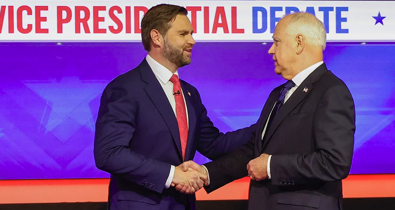 JD Vance and Tim Walz shake hands at VP Debate